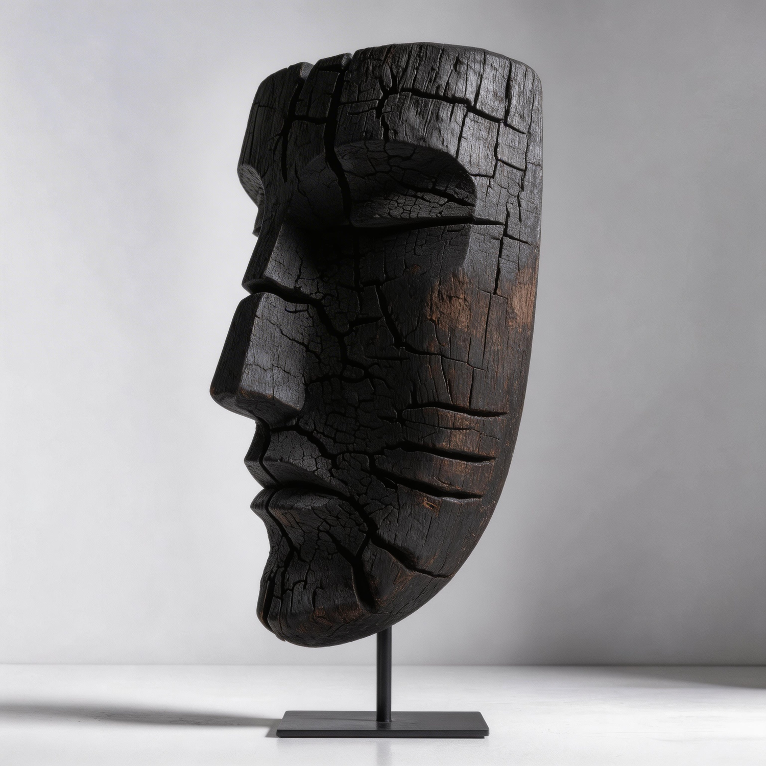 Charred Fragmented Visage Mask Sculpture