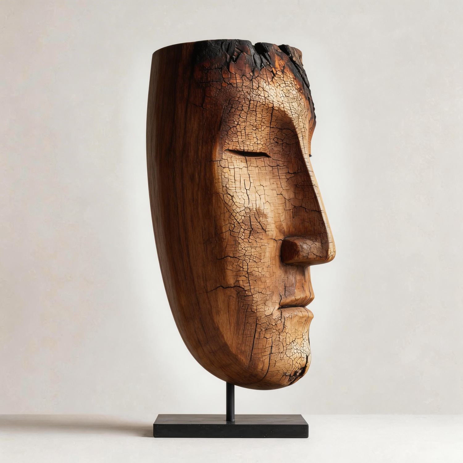 Charred Eroded Visage Sculpture