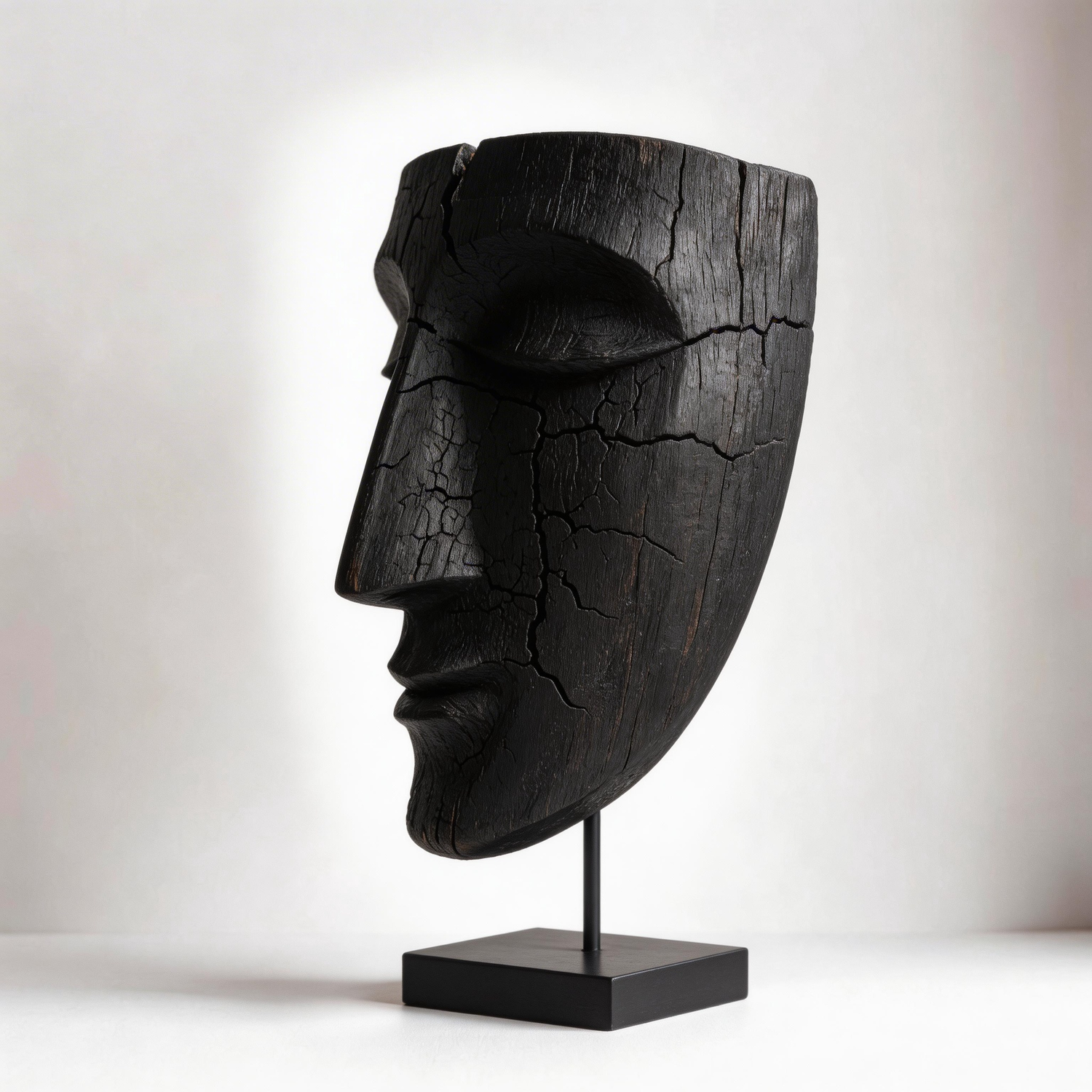 Charred Fragmented Eroded Mask Sculpture