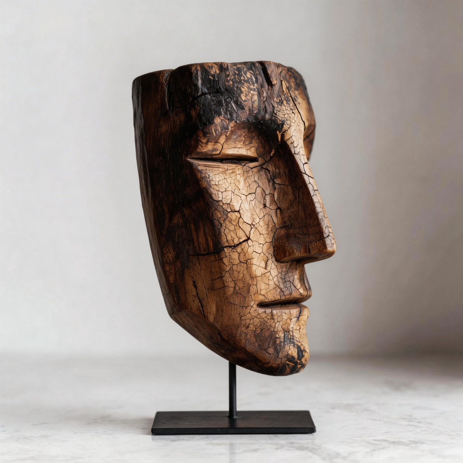Charred Cracked Visage Mask Sculpture